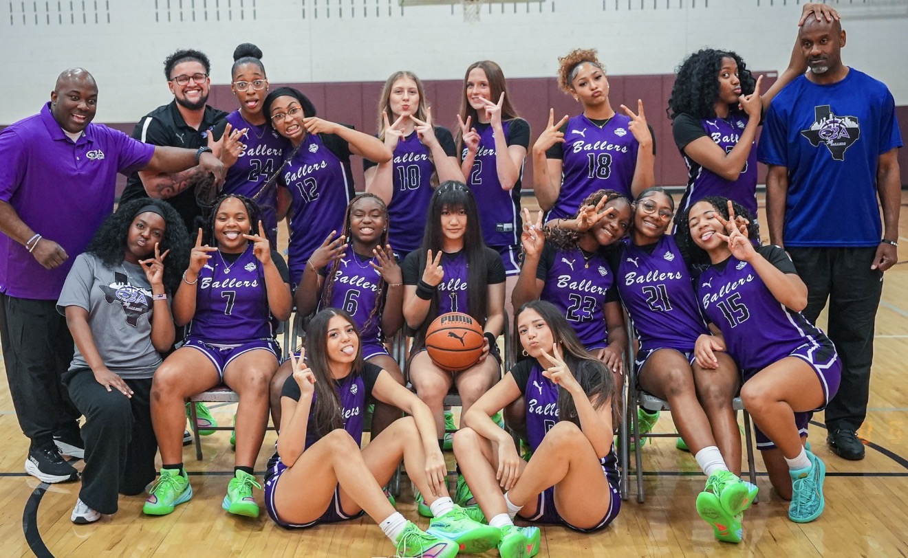 Ballers Ignited athletes and coaches smiling after a basketball event